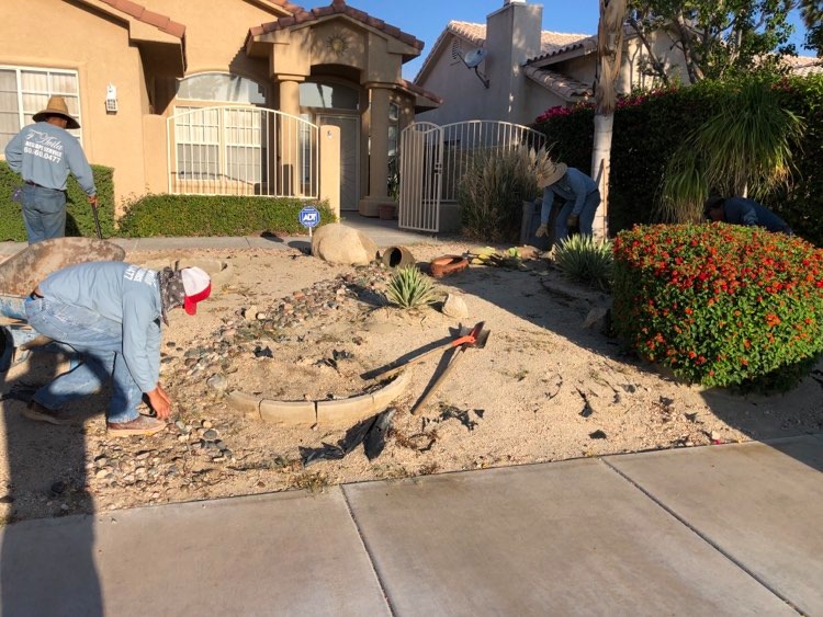 Front yard covered in sand, pre-work